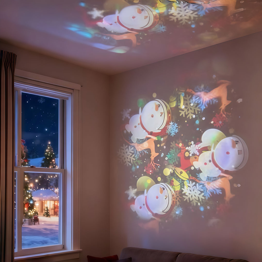 Projektorlampe som kaster snøfnugg på taket