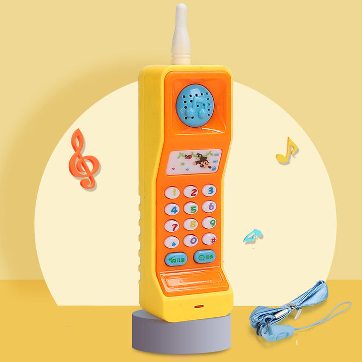 Leketelefon formet som gulrot med knapper
