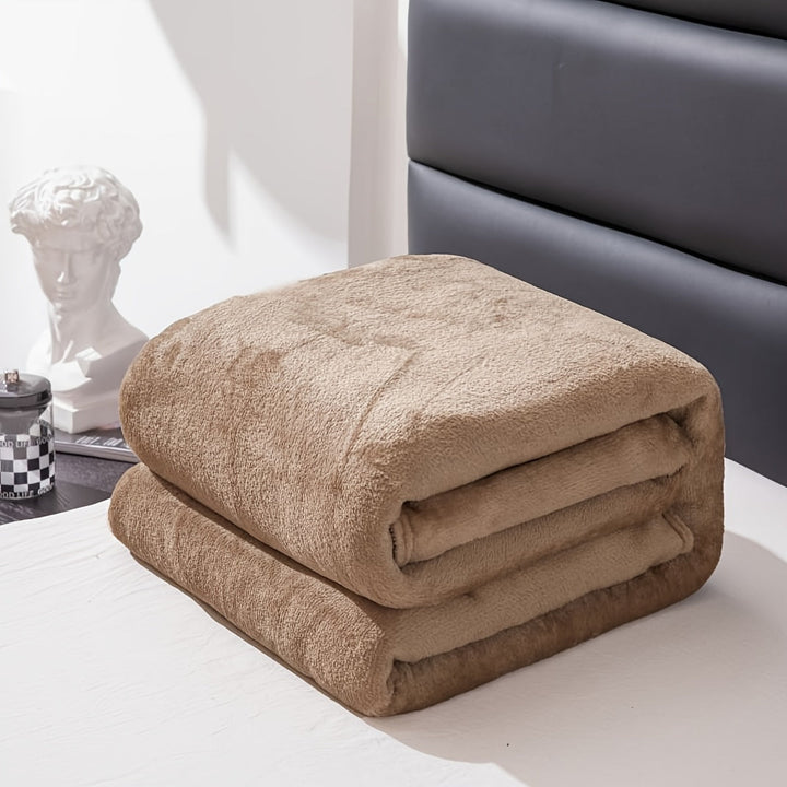 Mykt flanellpledd i polyester som varmer hele året