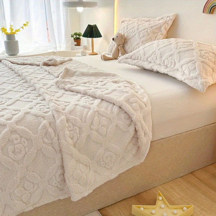 Fleecepledd med broderte blader og myk 3D-struktur