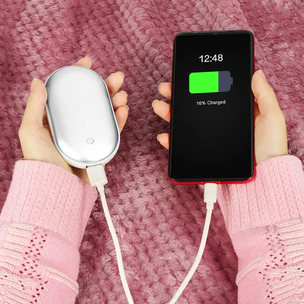 Sølvfarget håndvarmer med powerbank
