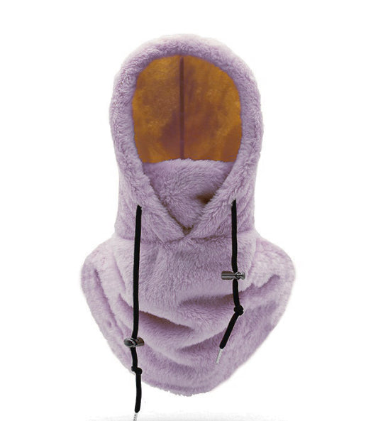Person med plysjbalaklava i beige