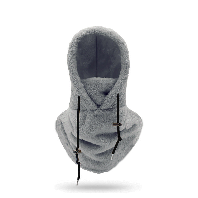 Person med plysjbalaklava i beige