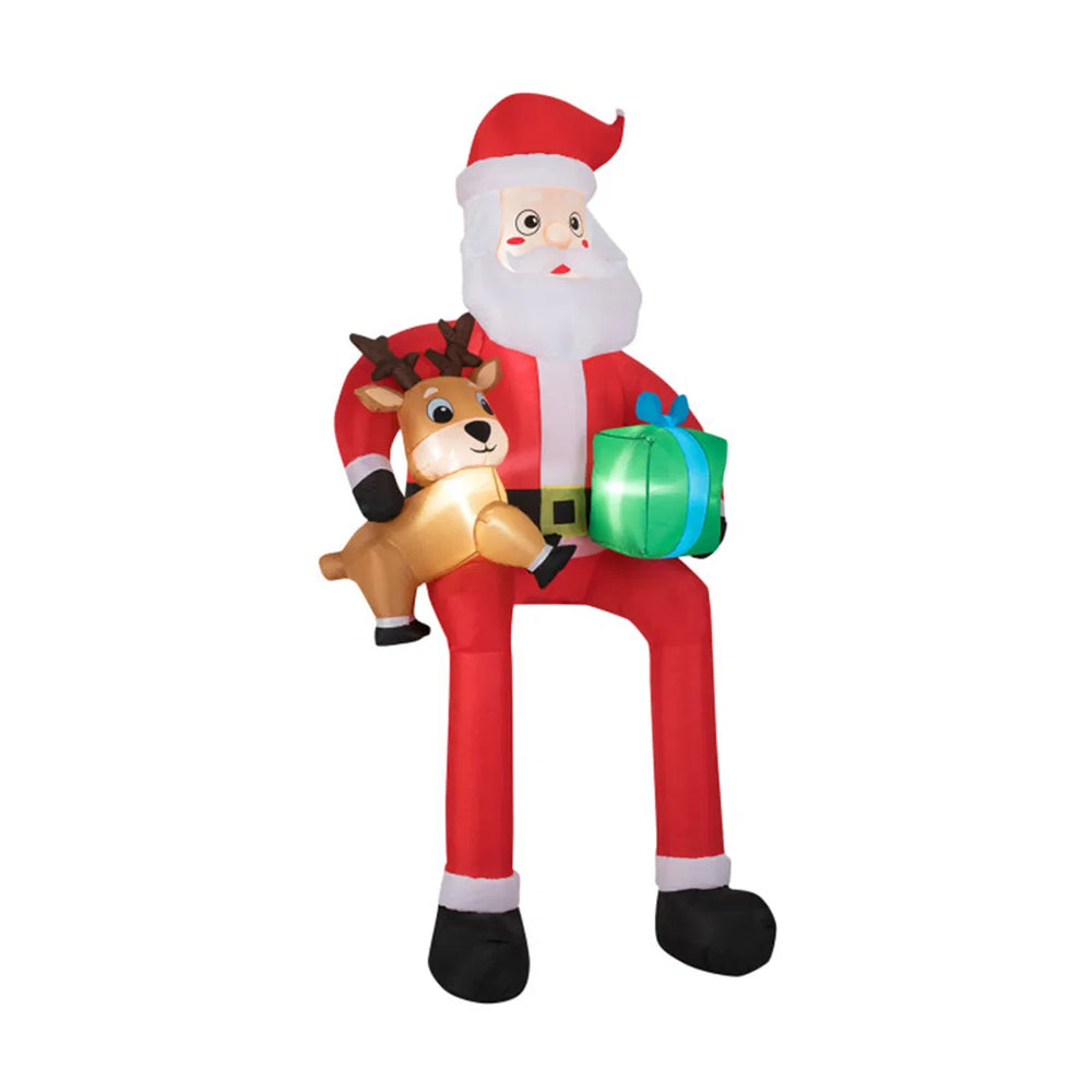 Stor oppblåsbar sittende nisse med reinsdyr