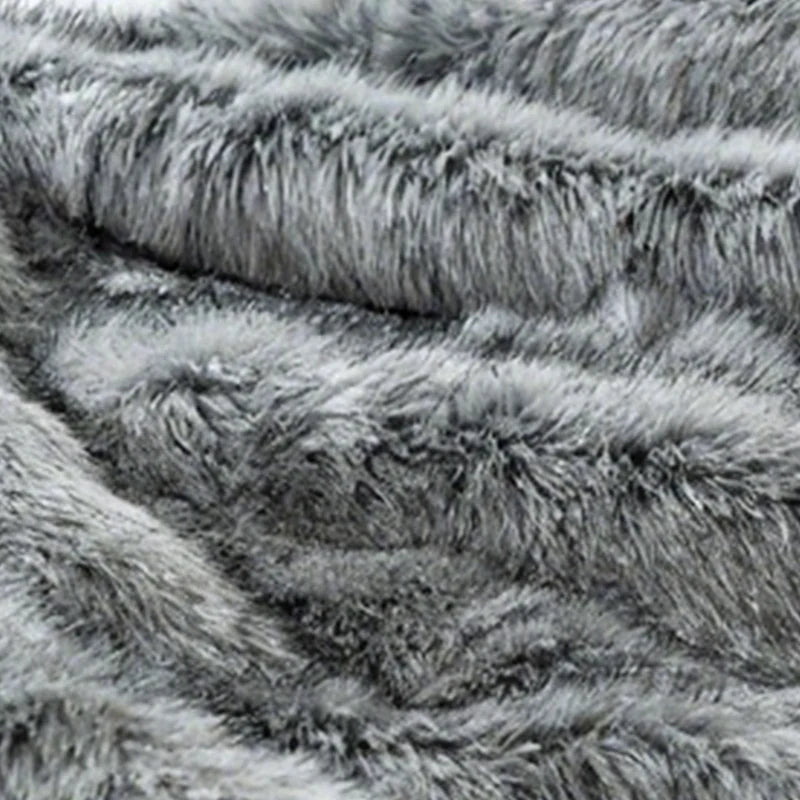 Fluffy pledd i kunstpels med forsterkede kanter