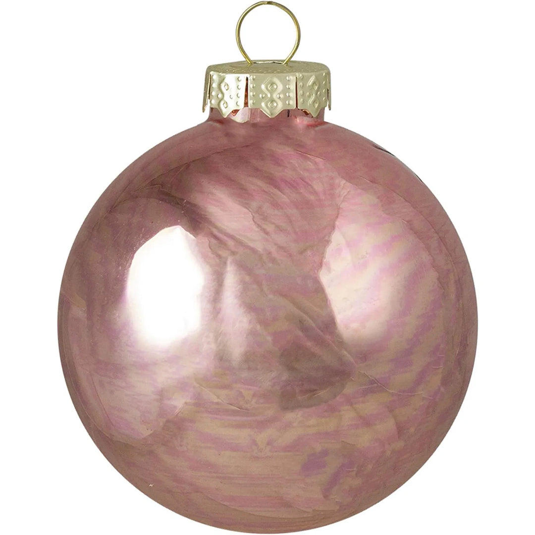 Ni rosa julekuler i glass med gulltopp