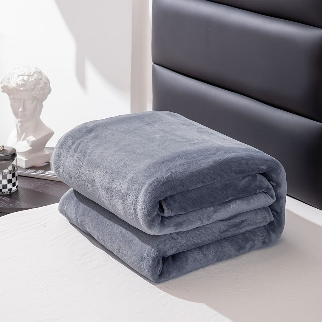 Mykt flanellpledd i polyester som varmer hele året