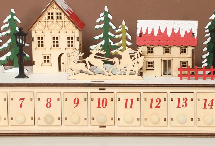 Lang adventskalender i tre med lys