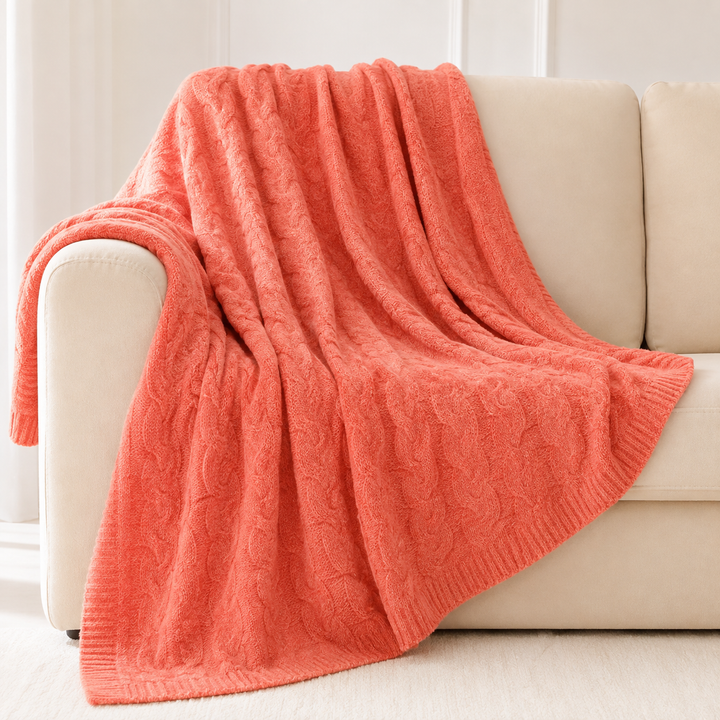 Flettestrikket pledd, lett og varm til sofaen og sengen