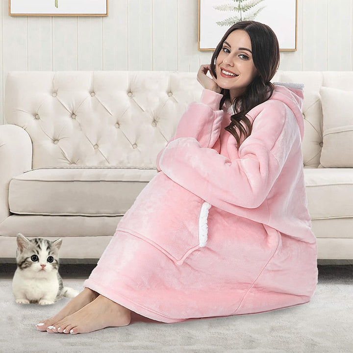 Pleddhettegenser i fleece med stor hette og lommer