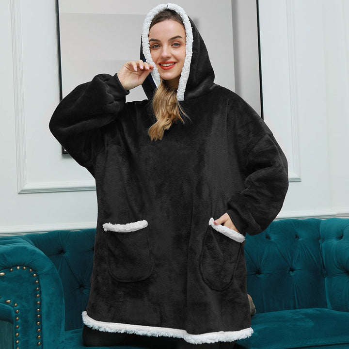 Pleddhettegenser i fleece med stor hette og lommer