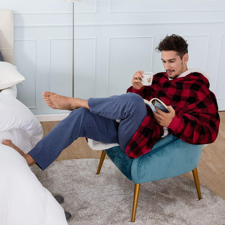 Pleddhettegenser i fleece med stor hette og lommer