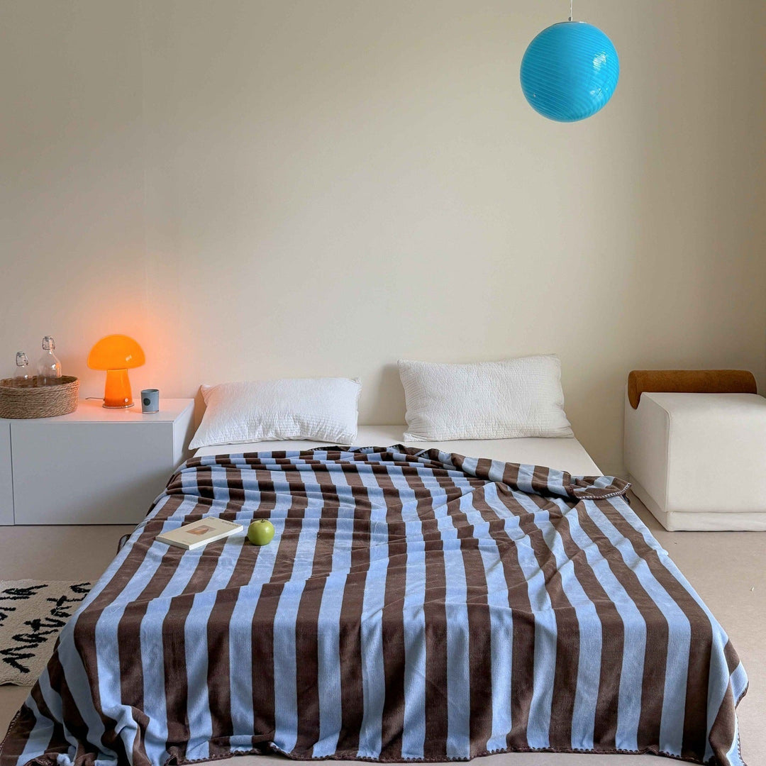 Myk pledd med dyremønster til sofa og seng
