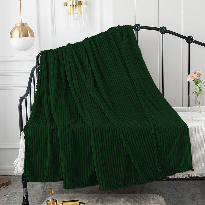 Ribbet plysjpledd med fløyelsmyk overflate og moderne stil