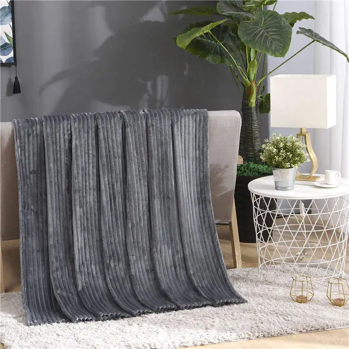 Lunvang™ Luftig pledd i flanellfleece med riflet struktur