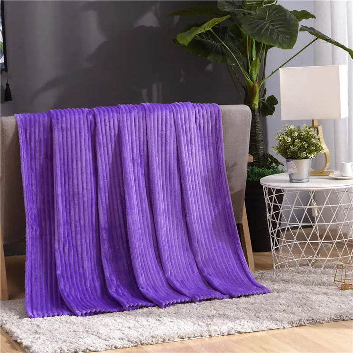 Luftig pledd i flanellfleece med riflet struktur