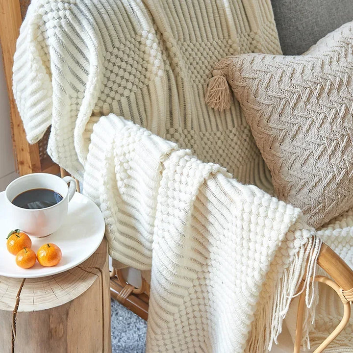 Grovstrikket pledd med myk følelse av kasjmir