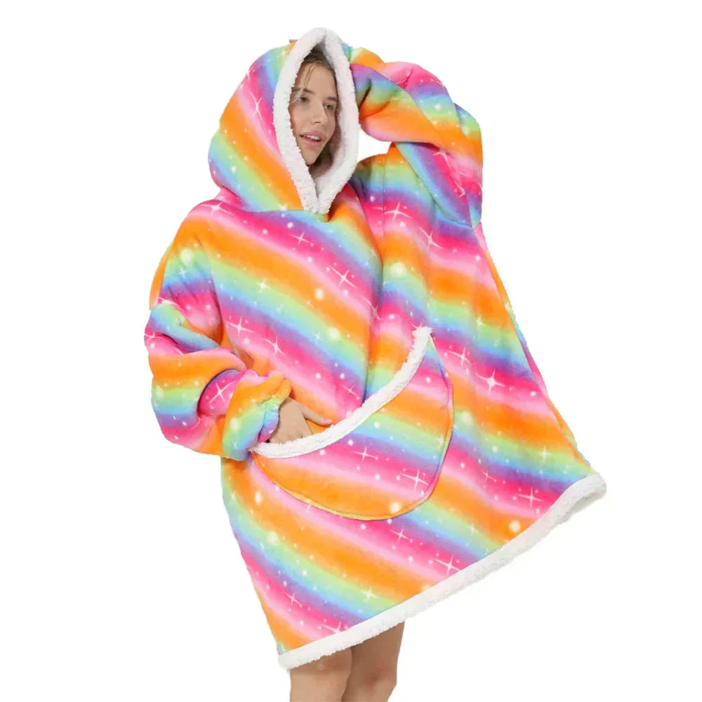 Oversized fleecepledd med hette og romslige lommer