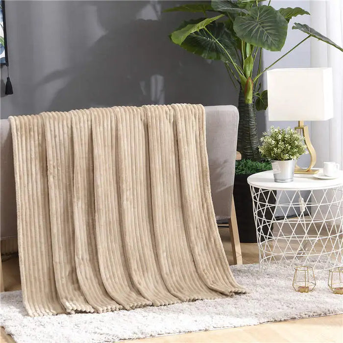 Lunvang™ Luftig pledd i flanellfleece med riflet struktur