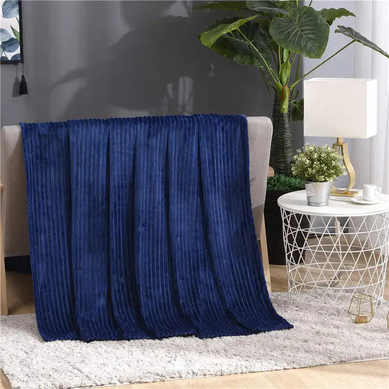Luftig pledd i flanellfleece med riflet struktur