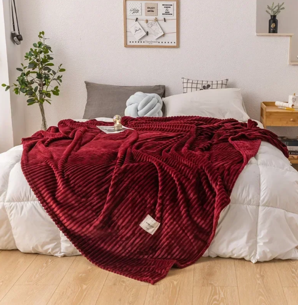 Myk flanellpledd som puster – varm pledd til sofa og seng