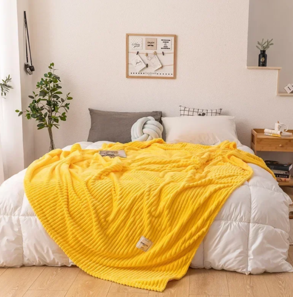 Myk flanellpledd som puster – varm pledd til sofa og seng