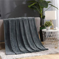 Lunvang™ Luftig pledd i flanellfleece med riflet struktur