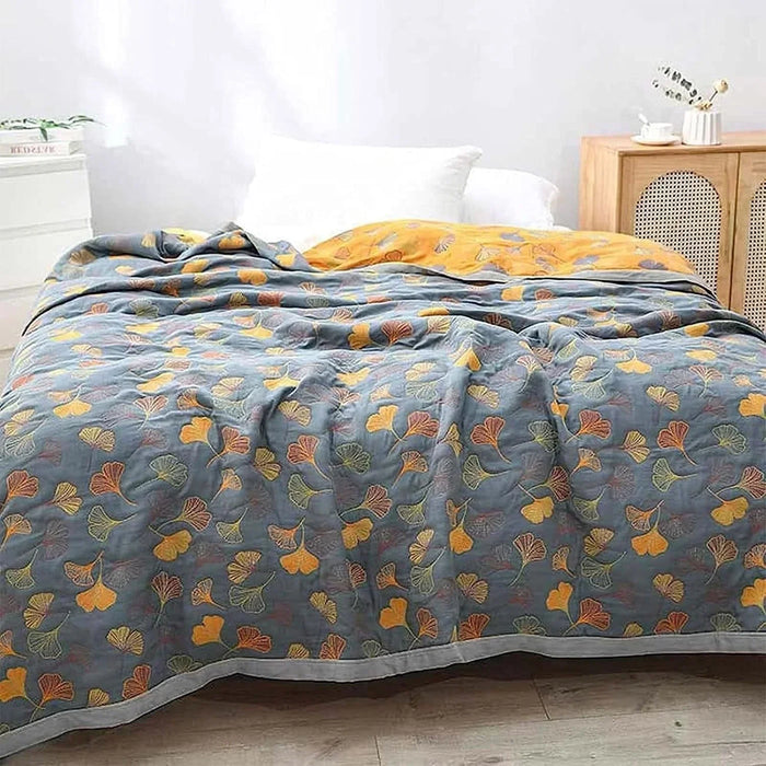 Lunvang™ Vendbart pledd med elegant mønster av ginkgoblader