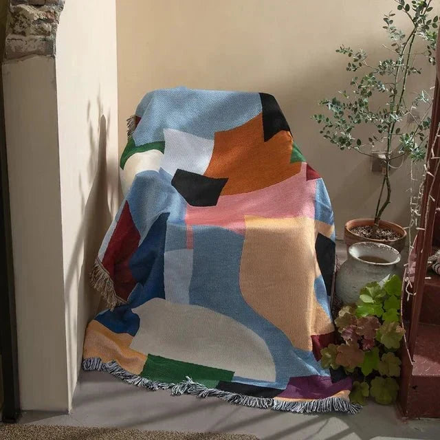 Vevd pledd med abstrakt motiv, jacquard til sofa og vegg