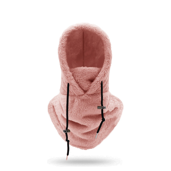 Person med plysjbalaklava i beige