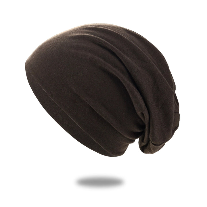 Slouch beanie i pustende strikk med stretch