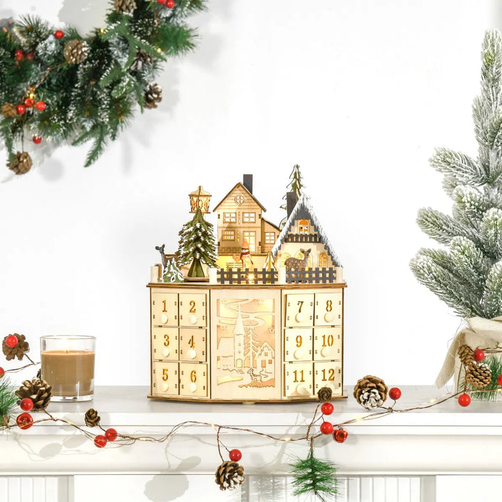 Adventskalender i tre som julelandsby med lys