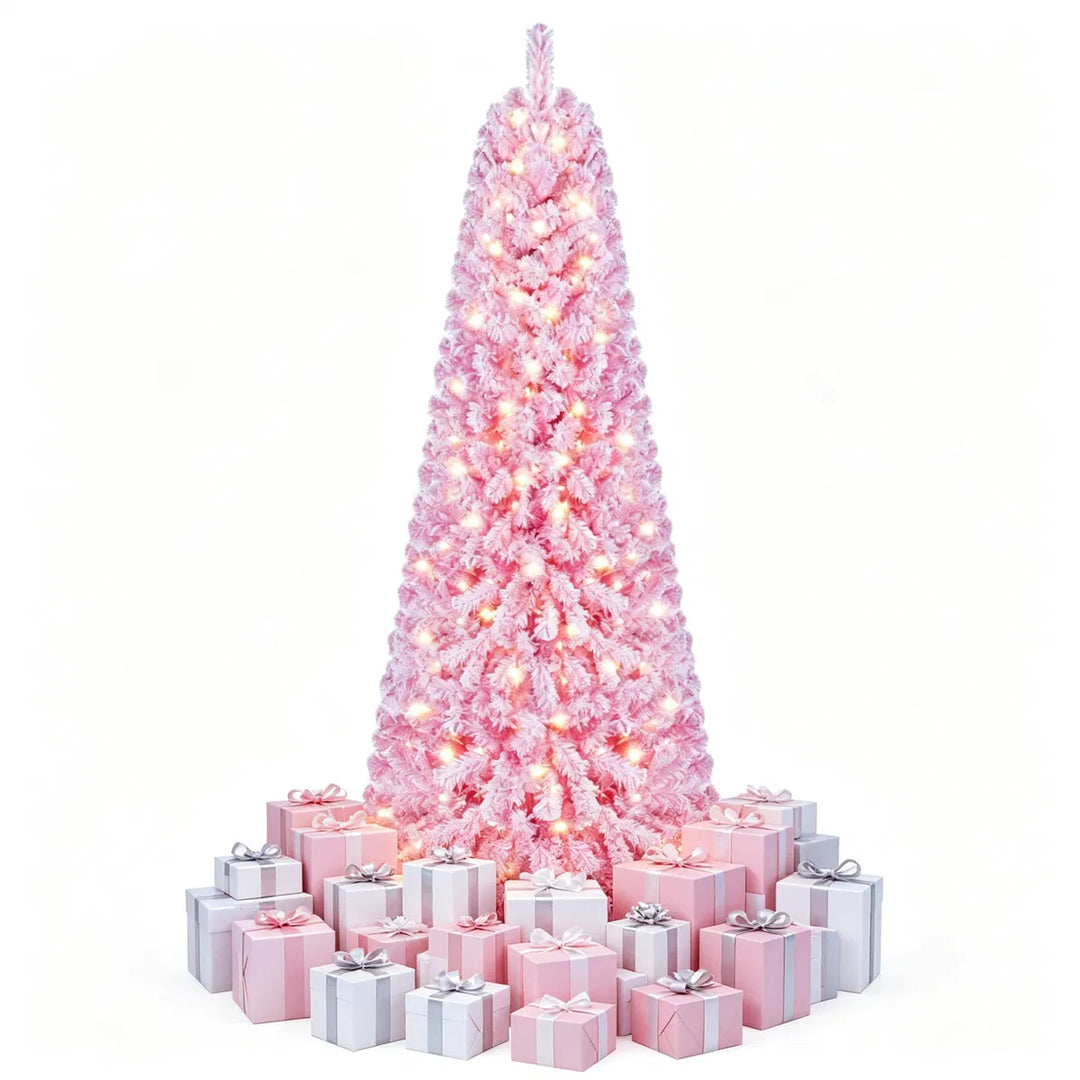 Rosa juletre med kunstsnø og lys