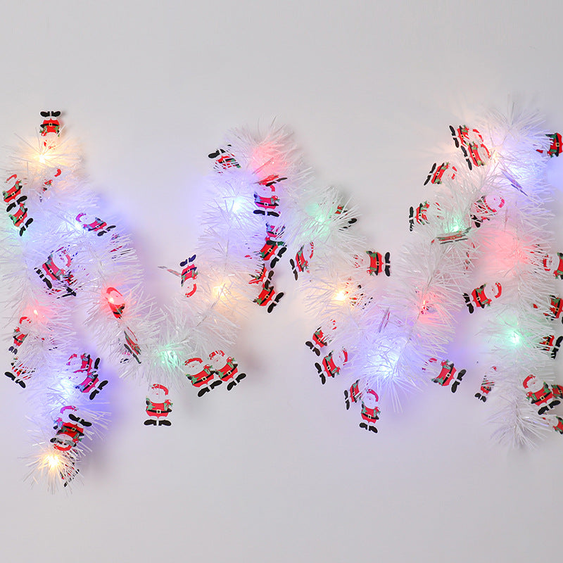 Glittergirlander med LED-lys og nisser