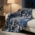 Lunvang™ Vendbart pledd i fuskepels med bakside i fløyelsfleece