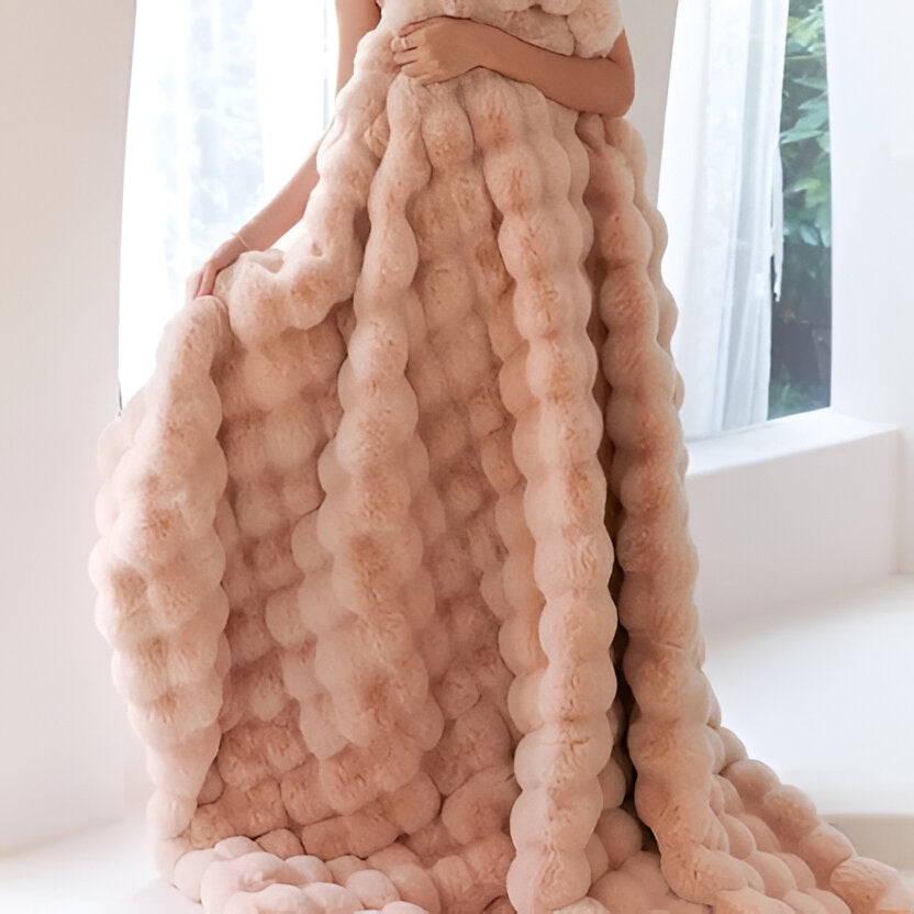 Myk plysjpledd for alle årstider med elegant design