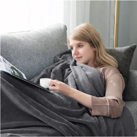 Vendbart vanntett og varmt pledd for sofa og seng