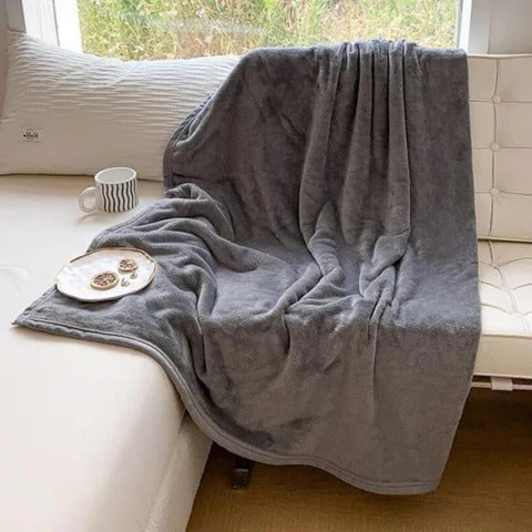 Vendbart vanntett og varmt pledd for sofa og seng