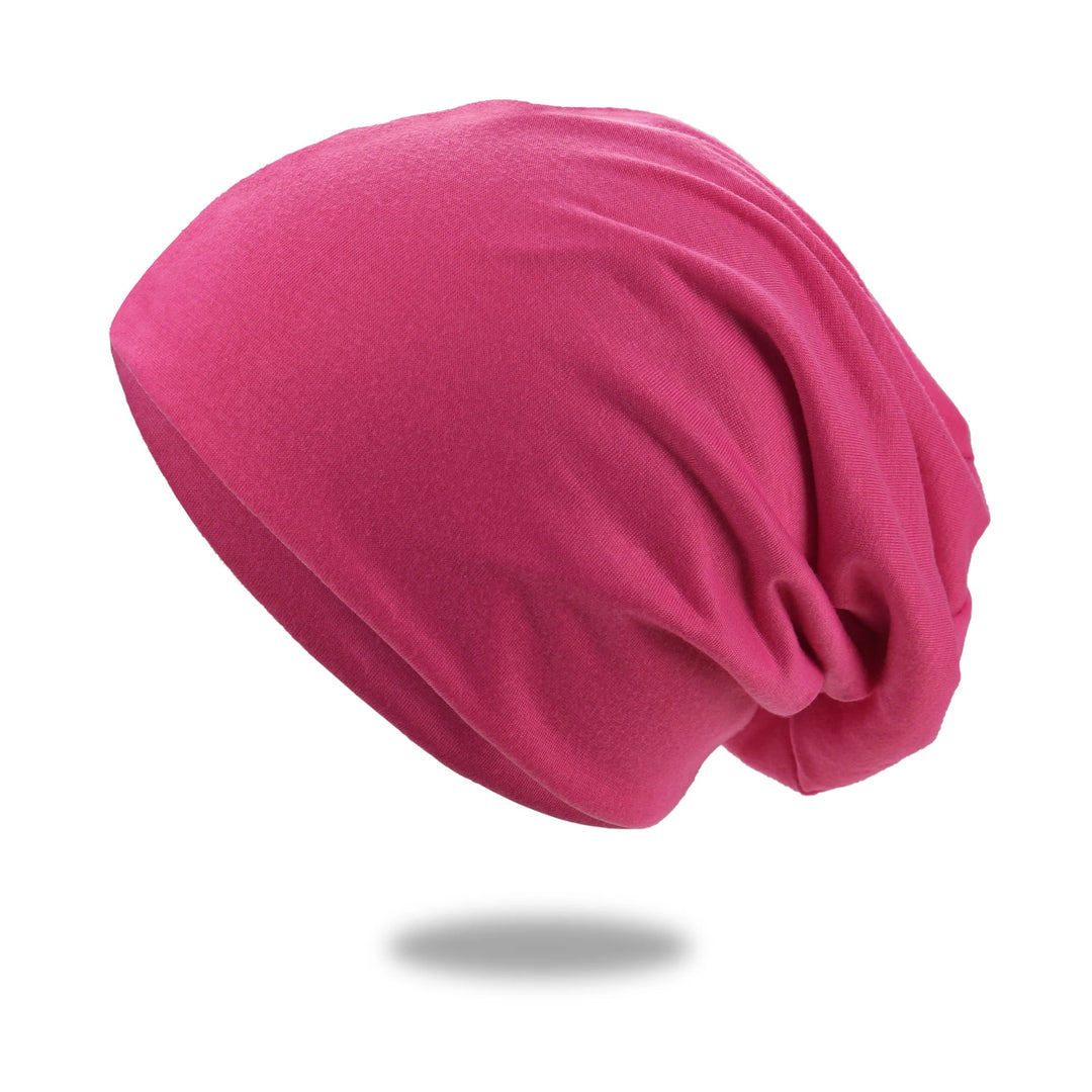 Slouch beanie i pustende strikk med stretch