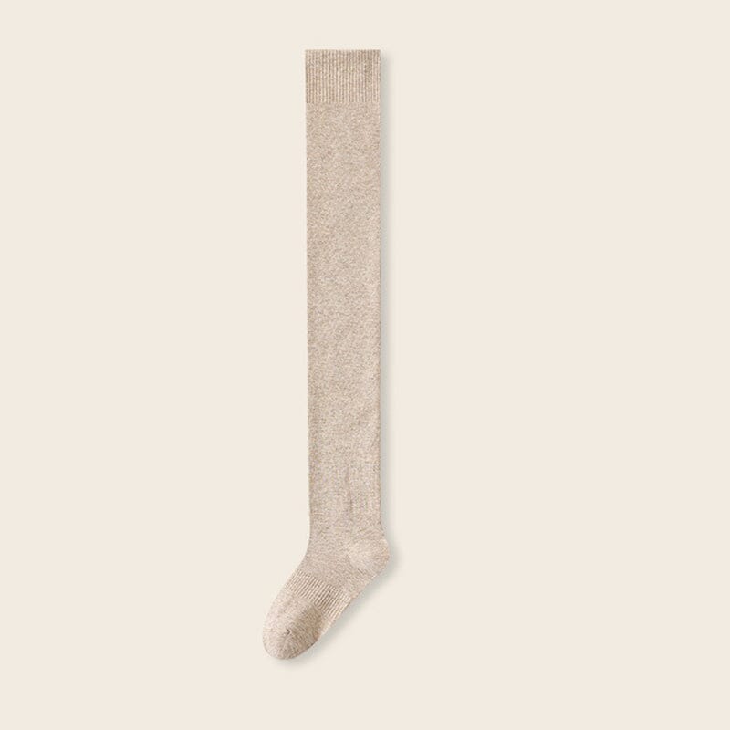 Tykke, høye bomullssokker som varmer og puster