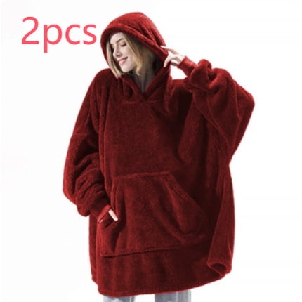 Oversized teppegenser i dobbeltsidig plysjfleece