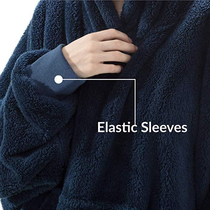 Oversized teppegenser i dobbeltsidig plysjfleece