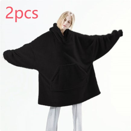 Oversized teppegenser i dobbeltsidig plysjfleece