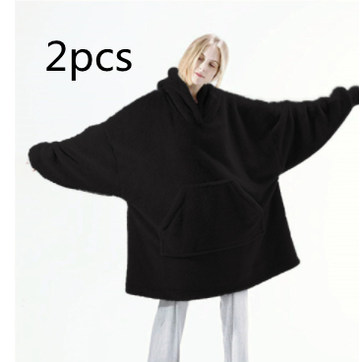 Oversized teppegenser i dobbeltsidig plysjfleece