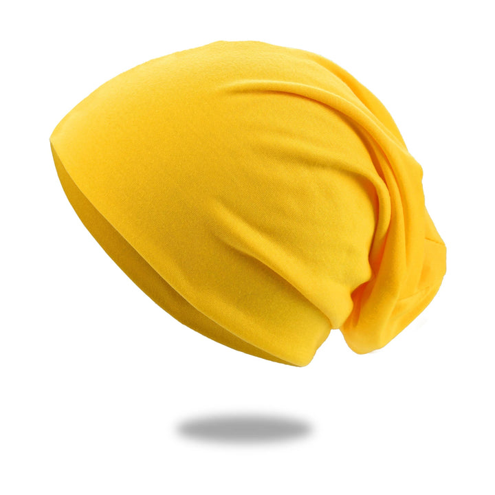 Slouch beanie i pustende strikk med stretch